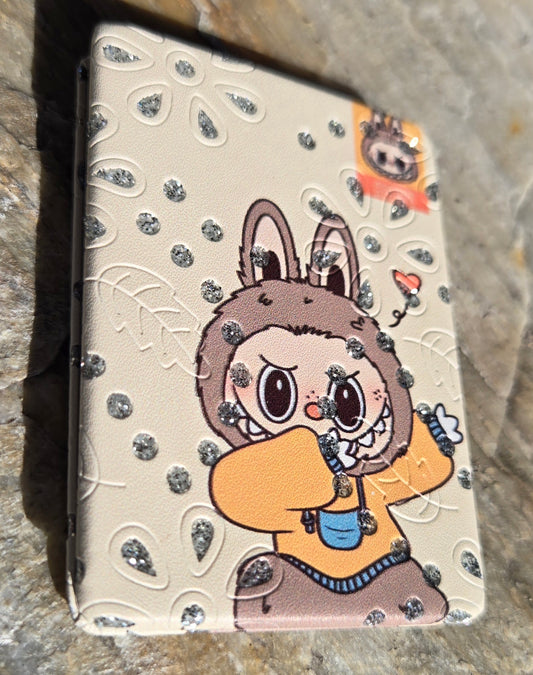 Two sided mirror with soft cover and sparkles